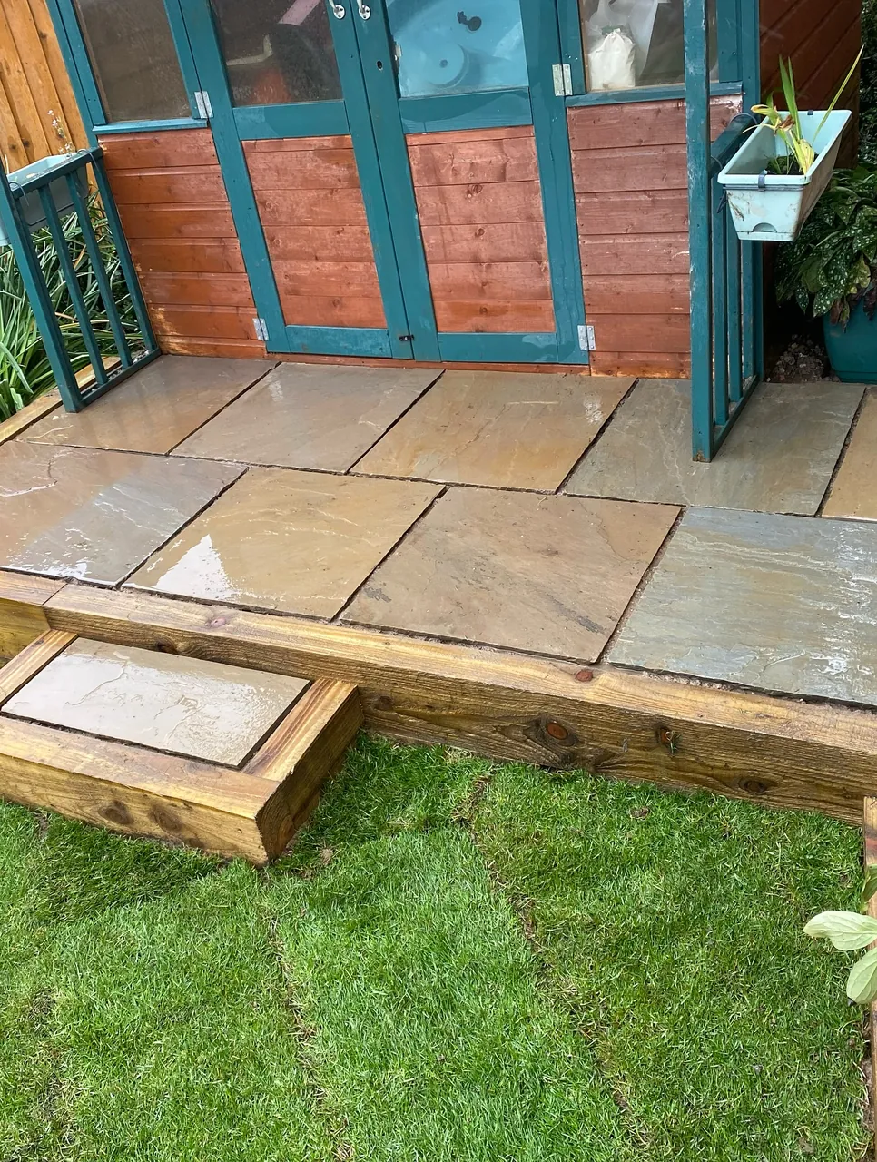 Patio paved with slabs by PaveForce Driveways
