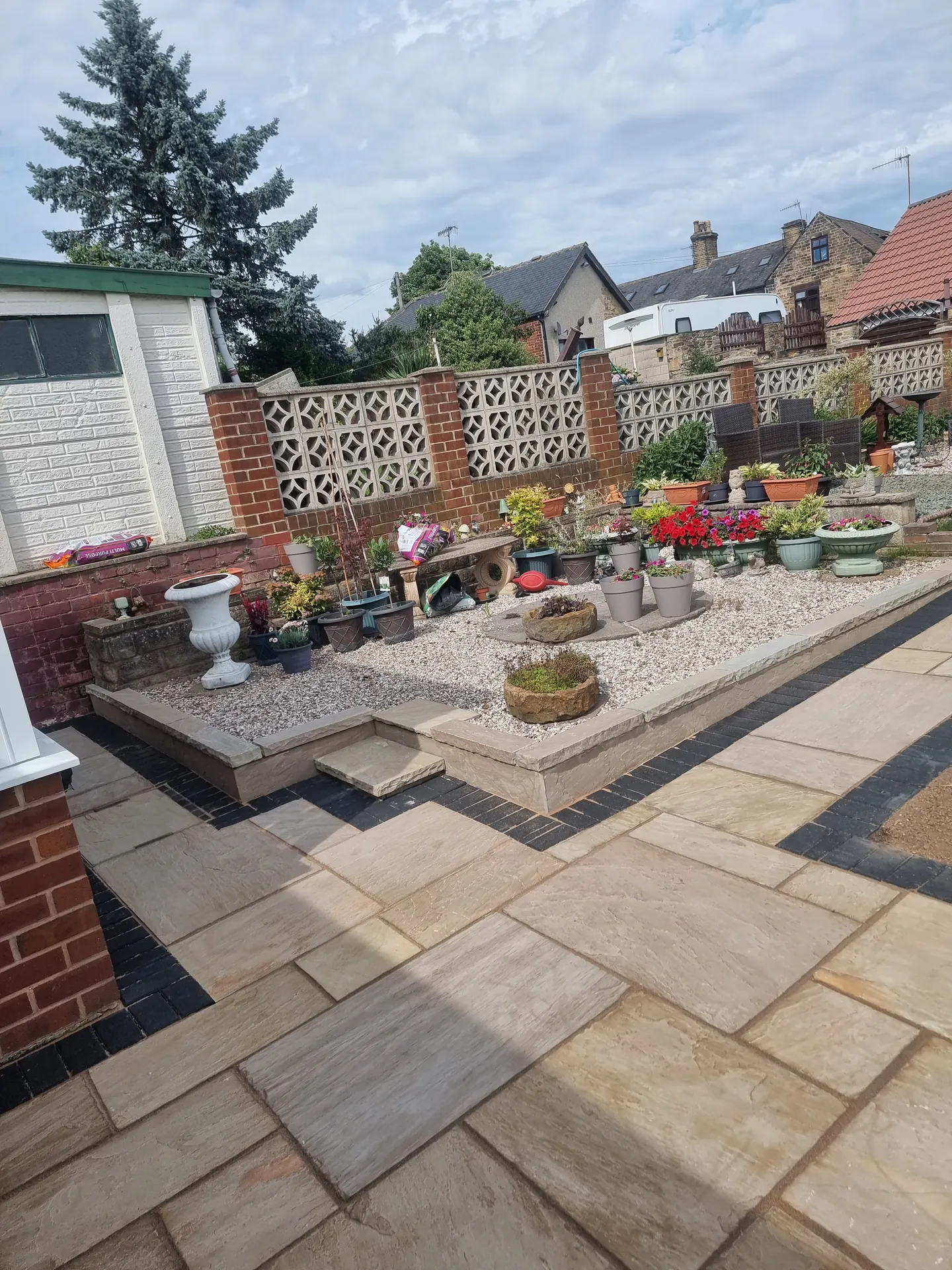 Patio paved with slabs by PaveForce Driveways