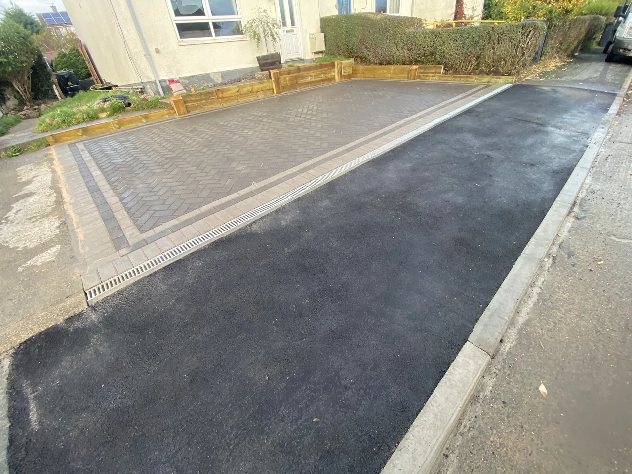 Tarmac driveway with a contrasting block border